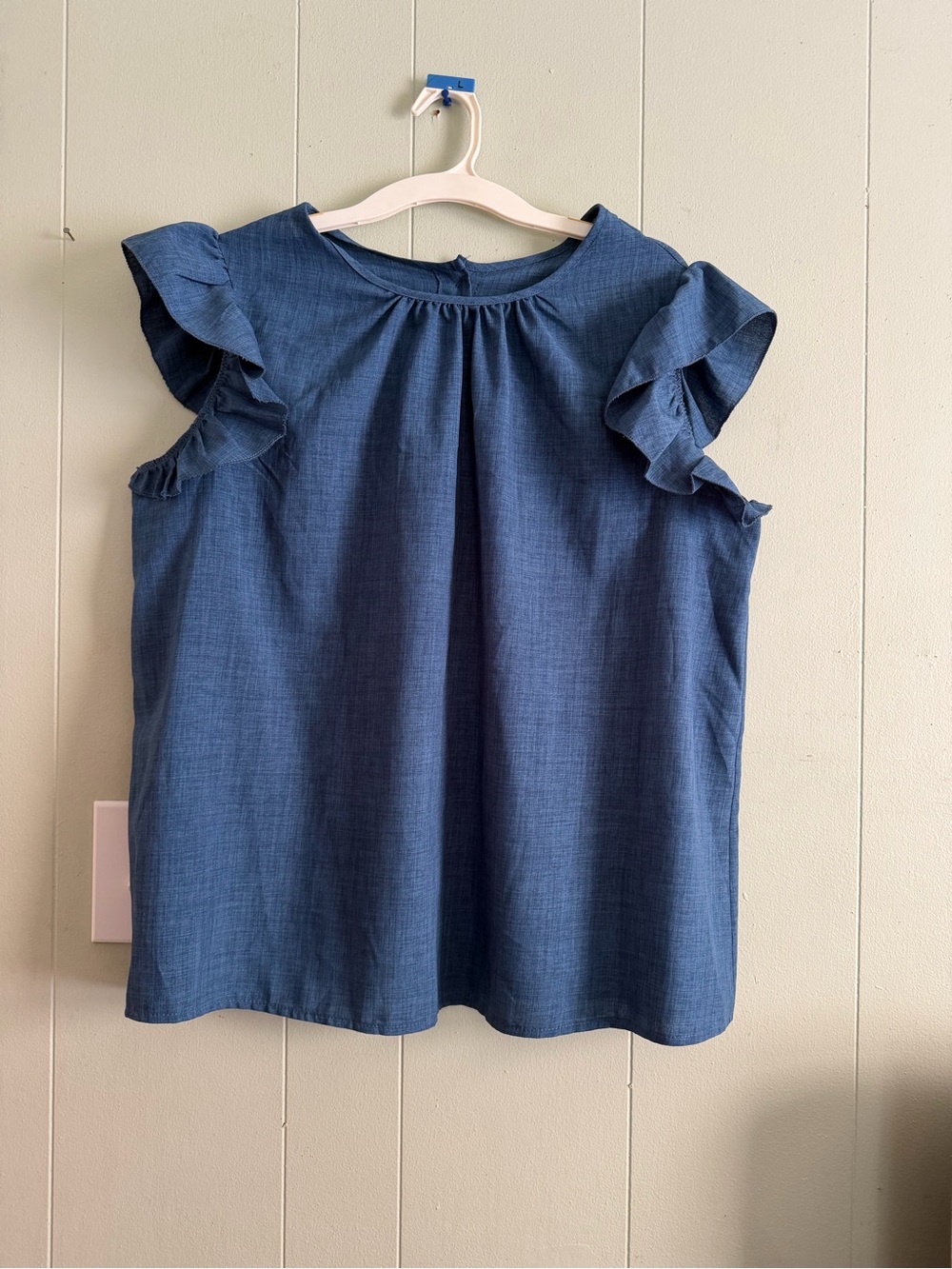 Women’s Blue Ruffle Sleeve Blouse with beautiful details on the back see Video